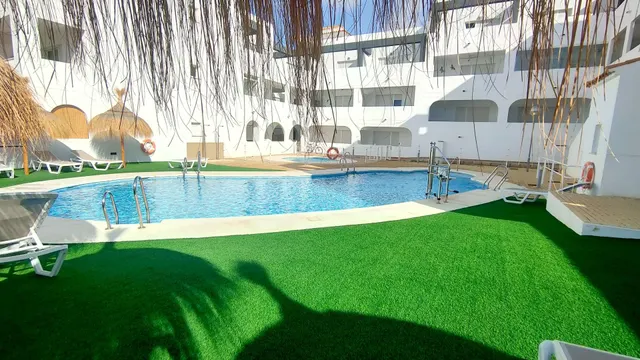 Apartamento de 1 dormitorio con terraza y piscina en Urbanización Milenio III en San Juan de los Terreros — 31