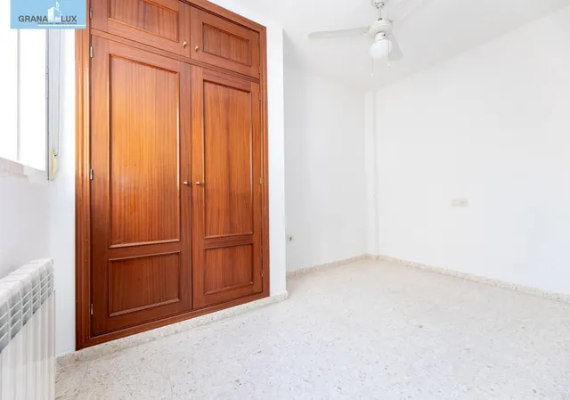 Vive en el corazón de Armilla: 4 dormitorios, patio, terraza y garaje — 16
