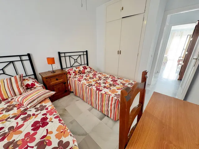 Casa adosada con dos patios privados y piscina comunitaria en Caleta de Vélez — 13