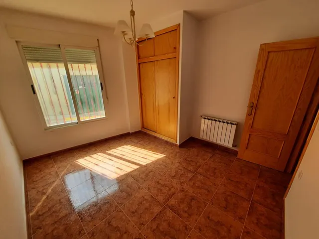 VIVIENDA EN PLANTA BAJA — 14