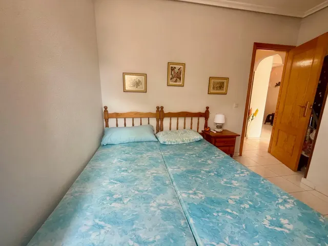 PISO EN PLANTA BAJA CON AMPLIA TERRAZA Y PISCINA EN VIÑAMAR 4, LA MATA — 11
