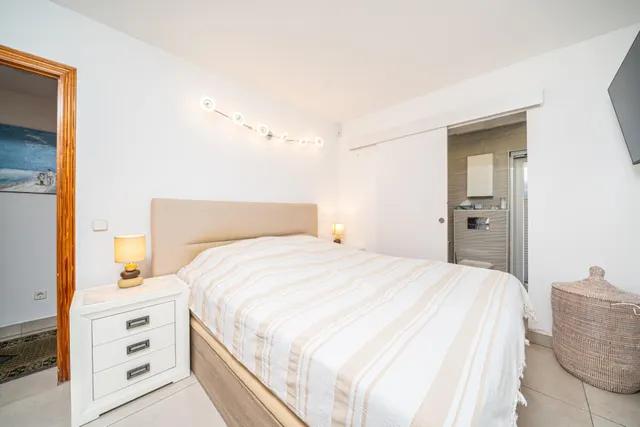 Planta baja totalmente reformada con jardín privado, sauna, piscina comunitaria y parking en Sa Coma — 16