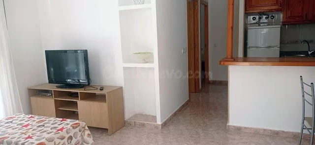 Bungalow esquinero renovado con terraza privada y piscinas comunitarias — 5
