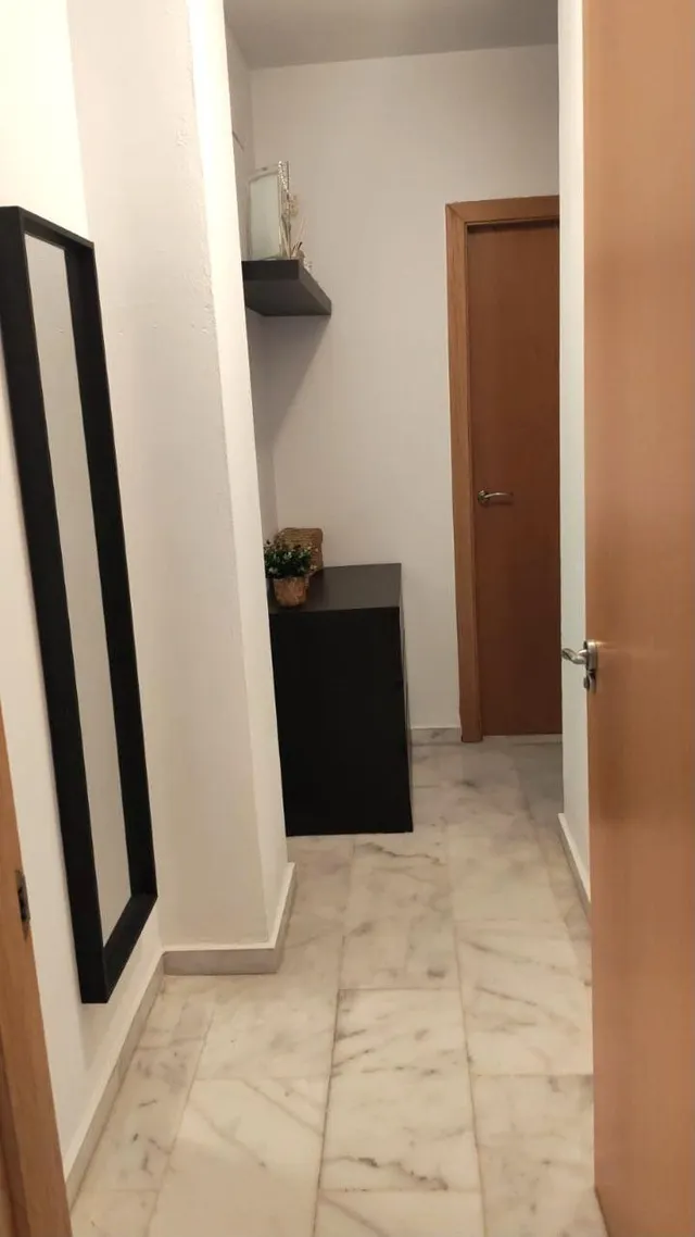 Casa de esquina con patio y chimenea en Villaverde del Río — 13
