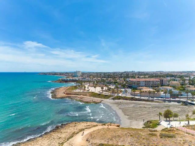 Bungalow de 2 dormitorios y piscina comunitaria en Orihuela Costa — 42