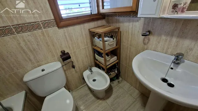 Adosado en Playa de Miramar a 600m del mar, con parcela de 213 m2, piscina comunitaria, barbacoa, chimenea y garaje para varios coches. — 17