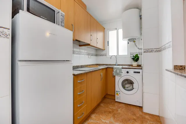 APARTAMENTO DE DOS DORMITORIOS CON VISTAS A LA LAGUNA ROSA Y CON PISCINA COMUNITARIA — 17