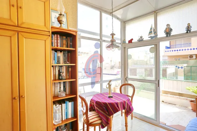Planta baja en venta en el centro de Guardamar del Segura con gran terraza privada y piscina comunitaria — 10