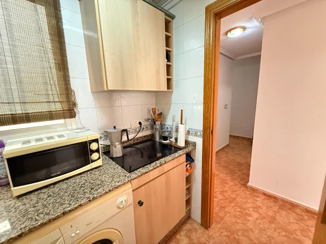 Apartamento de 2 dormitorios con orientación sur y garaje a 650 metros de playa del cura!!!!! — 33