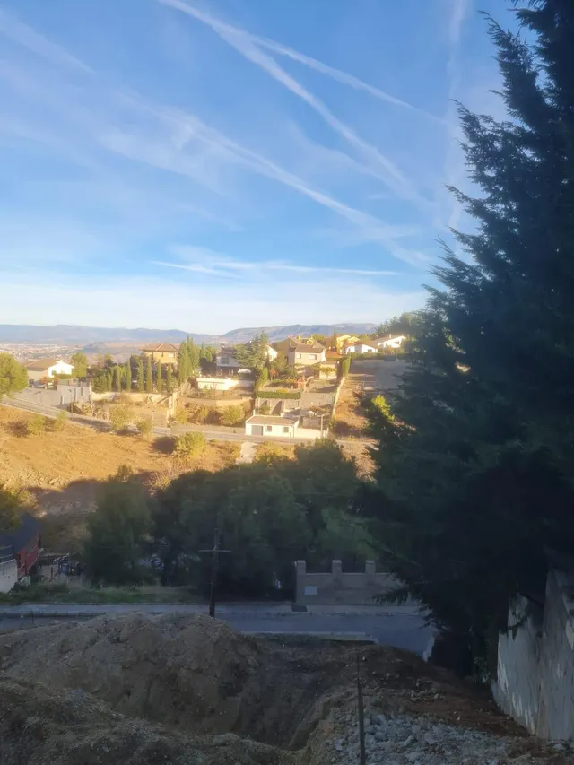Parcela con una casita de madera en Cumbres Verdes. — 28