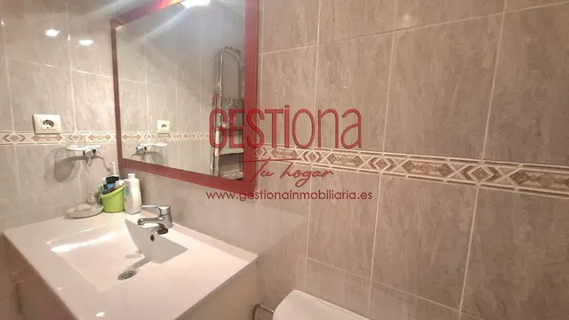 AMPLIO BAJO DE 3 habitaciones, CON TERRAZA JARDÍN A ESCASOS METROS DE LA PLAYA. ORIÑON — 31