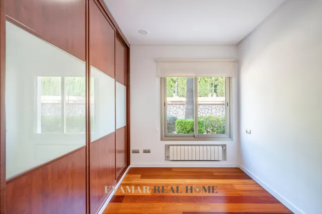 CHALET UNIFAMILIAR CON PISCINA DESBORDANTE Y VISTAS A LA SERRA DE TRAMUNTANA — 14