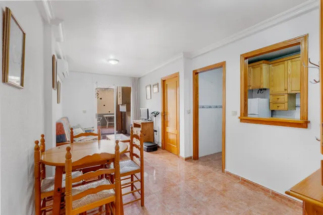 Acogedor piso en planta baja con piscina comunitaria — 2