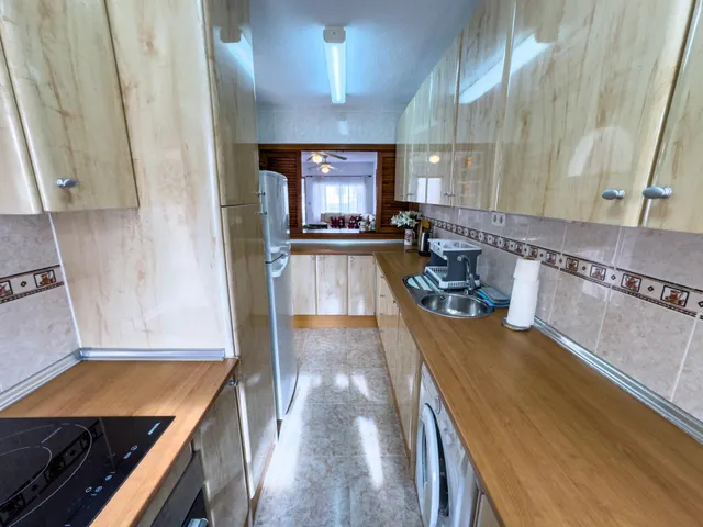 Encantador adosado de 2 plantas en Nueva Torrevieja — 2 dormitorios, 2 baños, gran patio y piscina comunitaria — 14