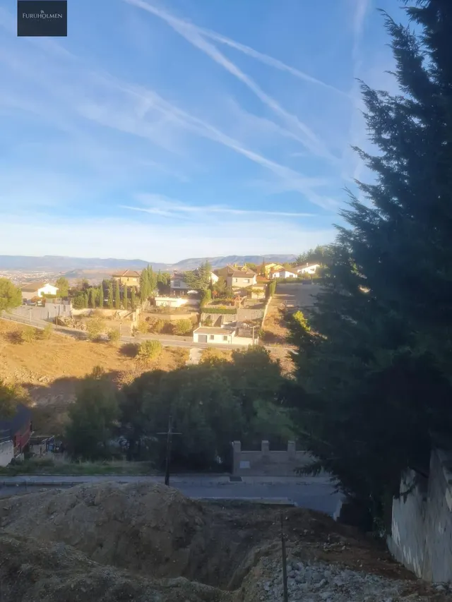 Parcela con una casita de madera en Cumbres Verdes. — 24