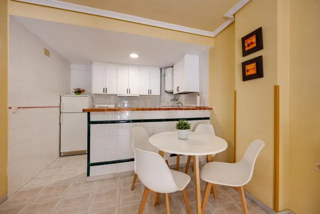 Planta baja de 2 dormitorios en Viñamar II con piscina, a 200 m de la Playa de La Mata — 7