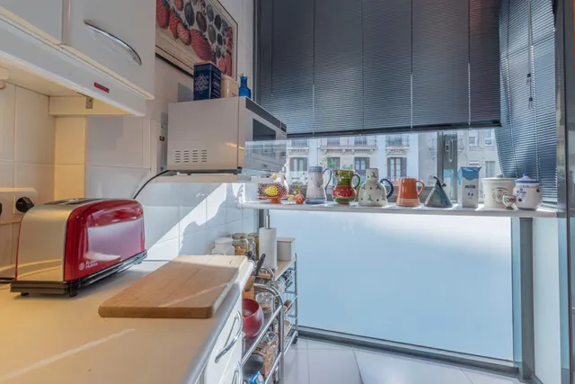 Acogedor piso de 2 dormitorios en el corazón de L'Eixample con posibilidad de alquiler de pk en la misma finca — 6