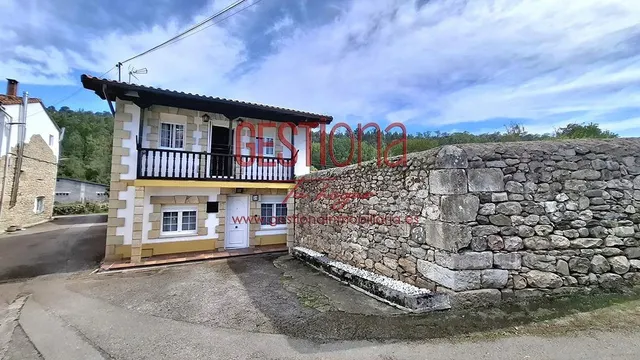 CASA COMPLETAMENTE REFORMADA EN ARENAS DE IGUÑA. — 36