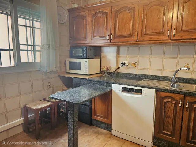 Piso de 4 dormitorios con plaza de garaje en San Basilio, con terraza de 20 m2 anexa al trastero en la cubierta. — 31