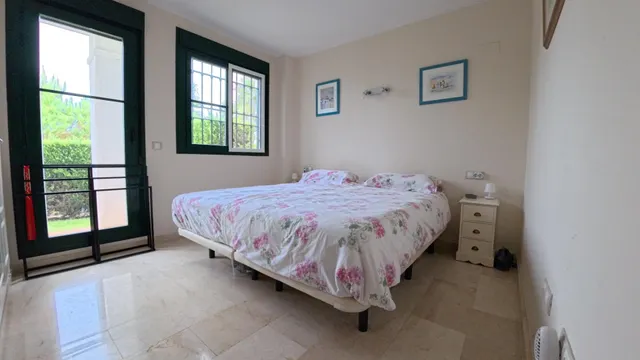 Apartamento de planta baja de esquina con 2 dormitorios con jardin y vistas parciales al mar — 15