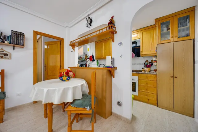 Bungalow de 2 dormitorios y piscina comunitaria en Orihuela Costa — 20