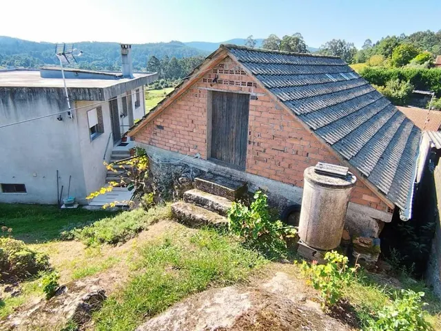 Casa de 3 habitaciones con finca. — 10