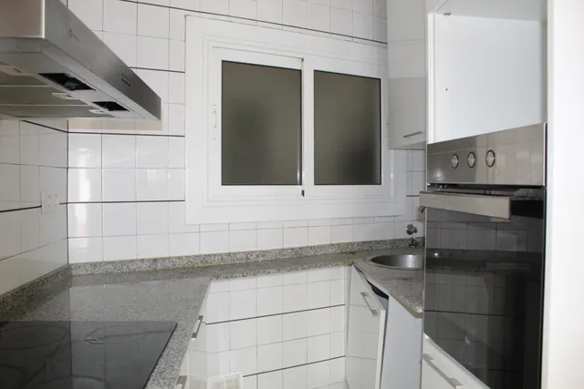 Piso con terraza de 45 m2 en Les Corts, 3 habitaciones y despacho — 22