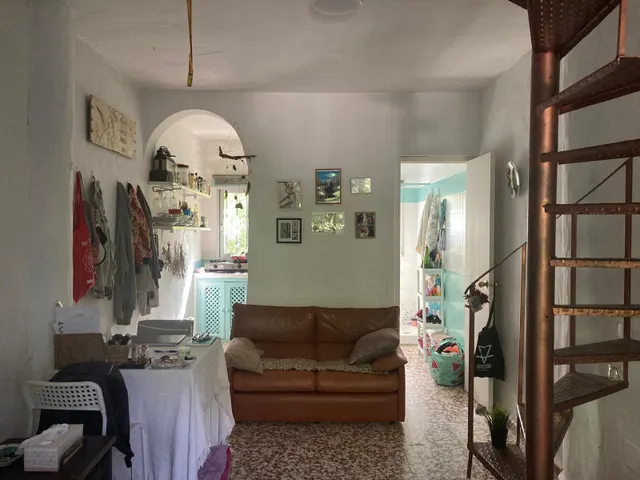 PARCELA CON TRES APARTAMENTOS — 15