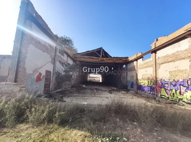 GRAN PARCELA CON INMUEBLES DIVERSOS EN LLIVIA IDEAL PARA RESTAURANTE CON GASOLINERA — 26