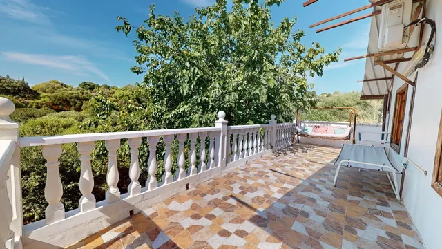 Parcela de más de 1.500 m2 con casa de madera y vistas despejadas en Cuevas Bajas, (Almodóvar del Río) — 8