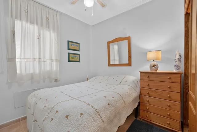 Villas Don Sancho V – Coqueto apartamento en planta baja con jardín, terrazas y piscina comunitaria. 2 dormitorios — 13