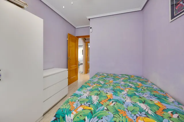 Bungalow de dos dormitorios y piscina comunitaria en Orihuela Costa — 17