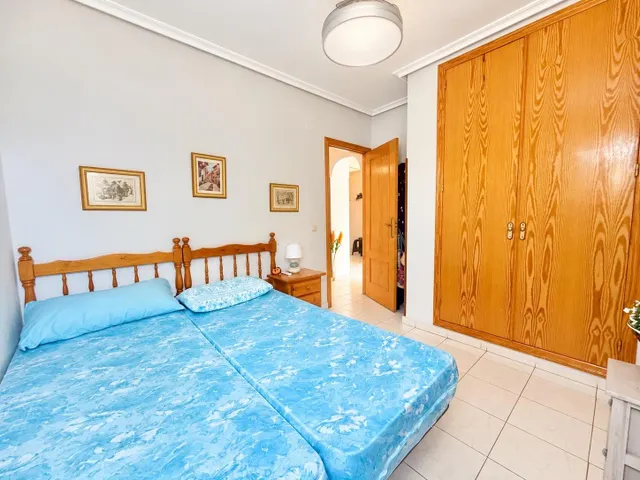 PISO EN PLANTA BAJA CON AMPLIA TERRAZA Y PISCINA EN VIÑAMAR 4, LA MATA — 12