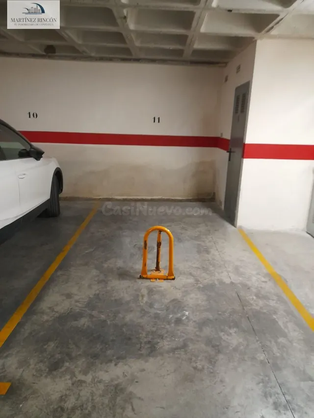Plaza de garaje con trastero