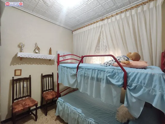 Casa adosada en esquina con dormitorio en planta baja — 28