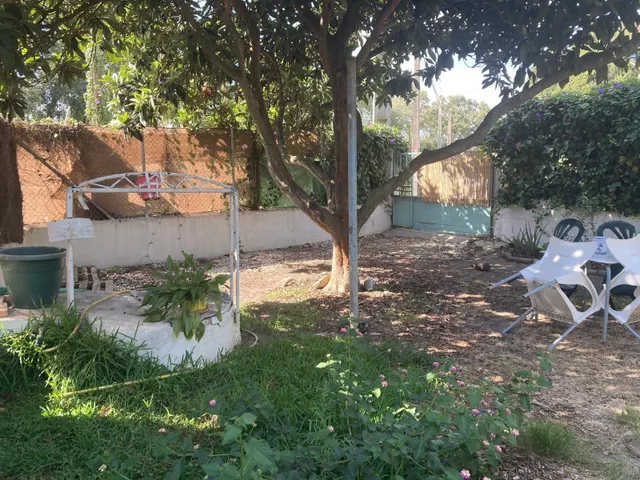 PARCELA CON TRES APARTAMENTOS — 26