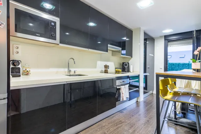 Bajo exterior con dos terrazas, garaje y trastero en urbanización con piscina y pista de tenis – San Román, Santander — 7