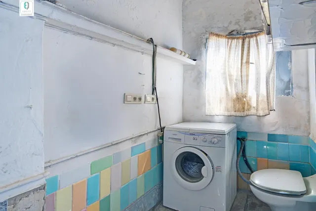 CASA CON TERRENO EN PLENO CENTRO DE ALBOLOTE — 24