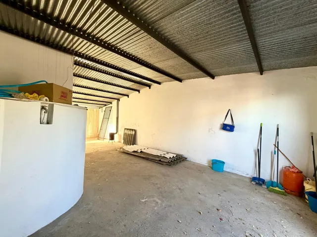 Casa de pueblo en pleno centro de La Joya con dos viviendas independientes y parcela de 500 m2 — 35