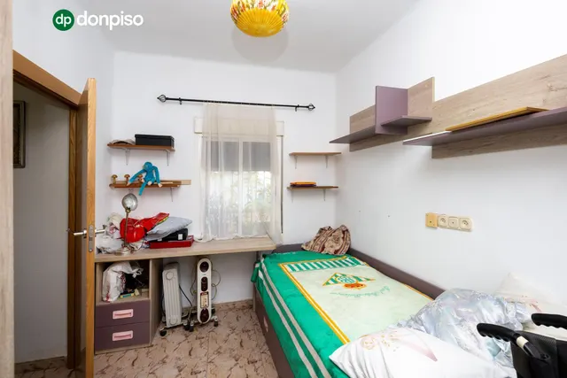 Vivienda en planta baja en el Zaidin. — 12