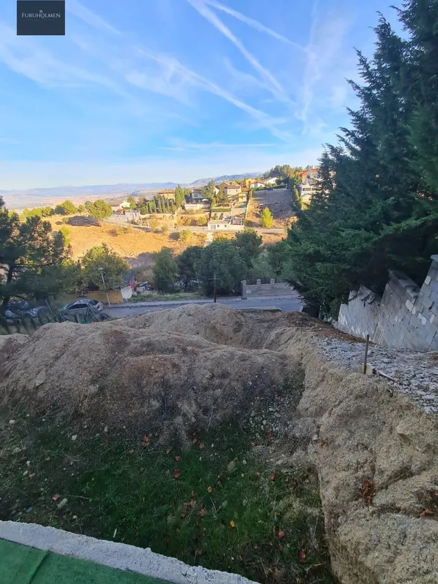 Parcela con una casita de madera en Cumbres Verdes. — 21