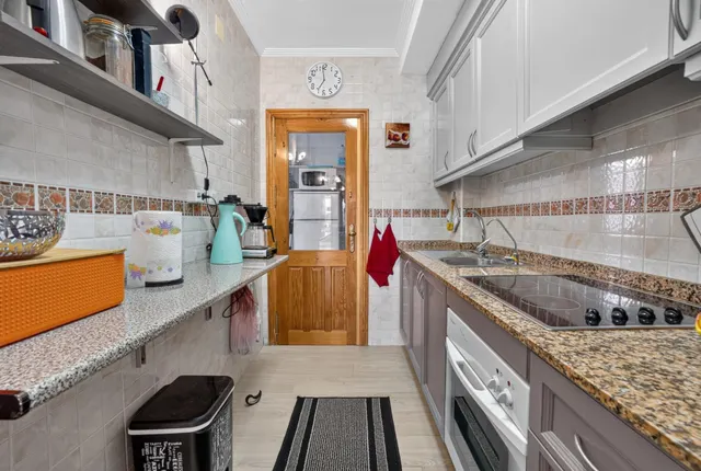 Villas Don Sancho V – Coqueto apartamento en planta baja con jardín, terrazas y piscina comunitaria. 2 dormitorios — 10