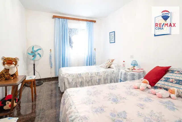 DOS CASAS MAS PARCELA DE 900  METROS — 32
