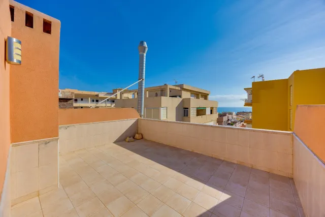 Ático duplex con solárium, vistas al mar y a 280 metros de la playa de La Mata — 28