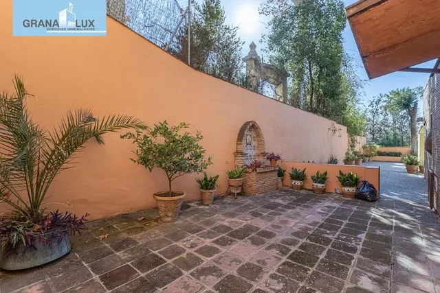 EXCLUSIVO PISO CON JARDÍN PRIVATIVO EN UNA DE LAS MEJORES URBANIZACIONES DE GRANADA — 10