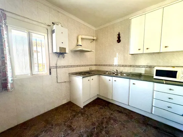 Casa de pueblo en pleno centro de La Joya con dos viviendas independientes y parcela de 500 m2 — 11