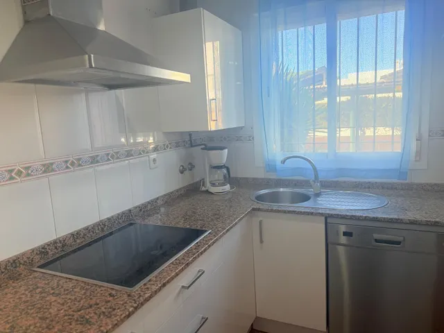 Apartamento en planta baja en urbanización Novo Sancti Petri. — 12