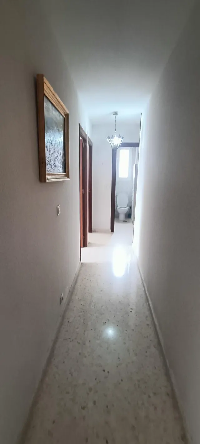 Piso de 3 dormitorios con piscina y garaje en urbanización cerca de la playa — 10