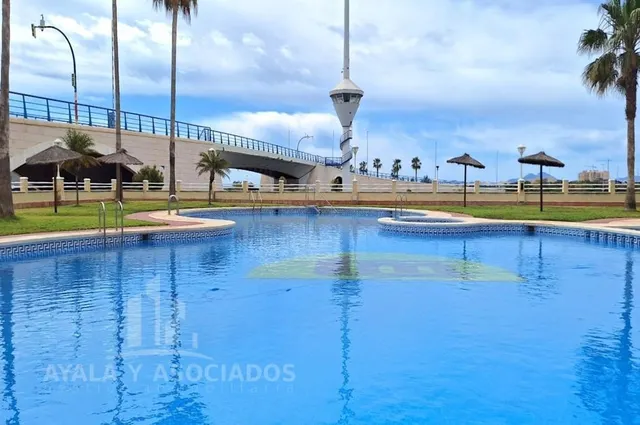 Apartamento en venta con terraza, piscina comunitaria y plaza de garaje, en la manga del mar menor, zona del estacio — 25