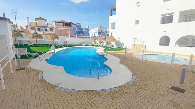 Apartamento de 1 dormitorio con terraza y piscina en Urbanización Milenio III en San Juan de los Terreros — 25